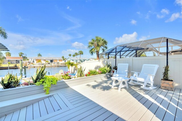 1015 Spindle Palm Way, Apollo Beach, FL 33572 - wooden deck with fence and a water view