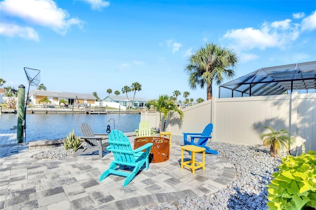 1015 Spindle Palm Way, Apollo Beach, FL 33572 - view of patio with a water view, fence, and a dock