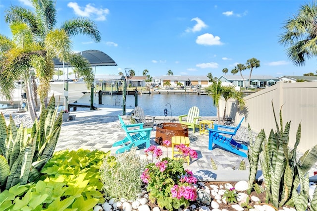 1015 Spindle Palm Way, Apollo Beach, FL 33572 - dock area featuring fence, boat lift, and a water view