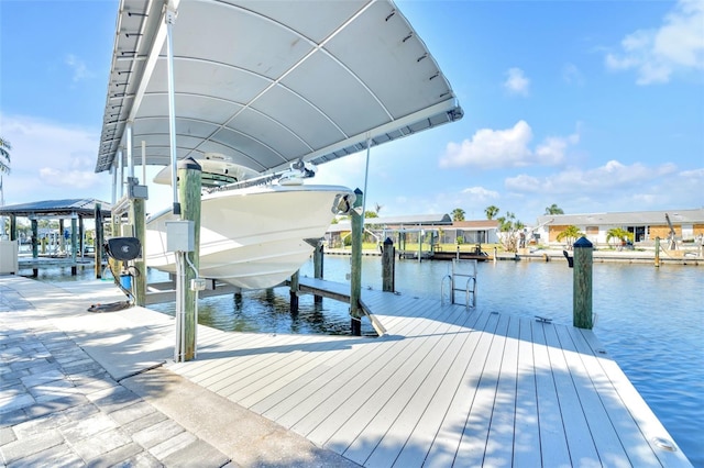1015 Spindle Palm Way, Apollo Beach, FL 33572 - dock area with boat lift and a water view