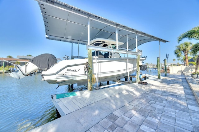 1015 Spindle Palm Way, Apollo Beach, FL 33572 - dock area featuring a water view and boat lift