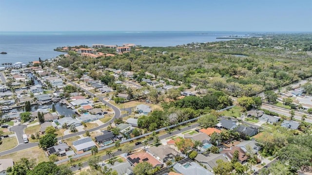 bird's eye view with a residential view and a water view