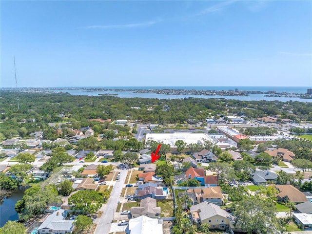 birds eye view of property featuring a residential view and a water view