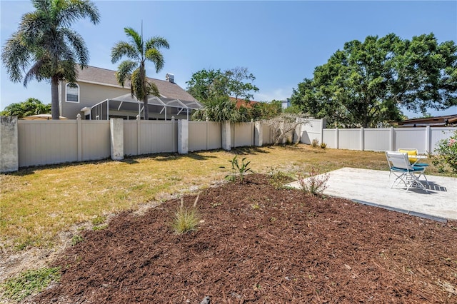 view of yard with a patio and a fenced backyard