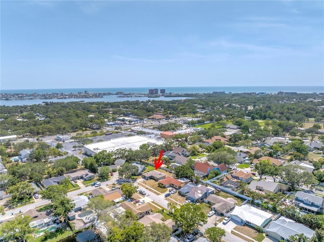 birds eye view of property featuring a residential view and a water view