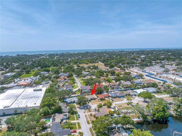 aerial view with a residential view and a water view