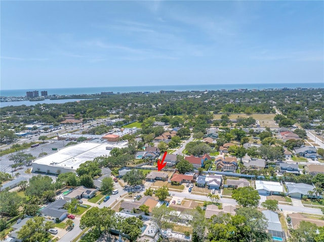 aerial view featuring a water view and a residential view