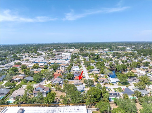 birds eye view of property with a residential view