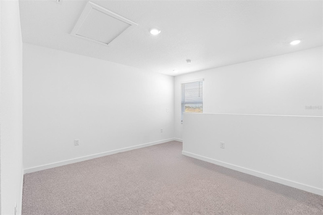124 Hallam Ct, Spring Hill, FL 34606 - unfurnished room featuring recessed lighting, baseboards, and light carpet