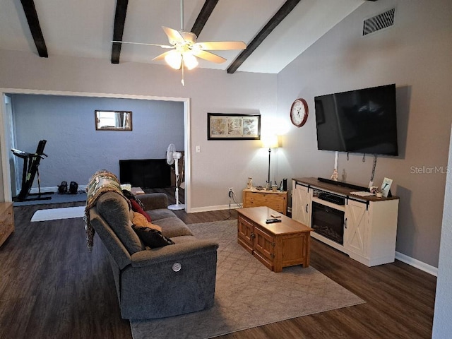living area with wood finished floors, ceiling fan, visible vents, and baseboards