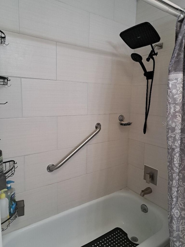 full bath featuring shower / bath combo