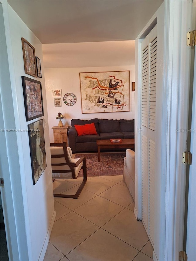 living room featuring light tile patterned flooring