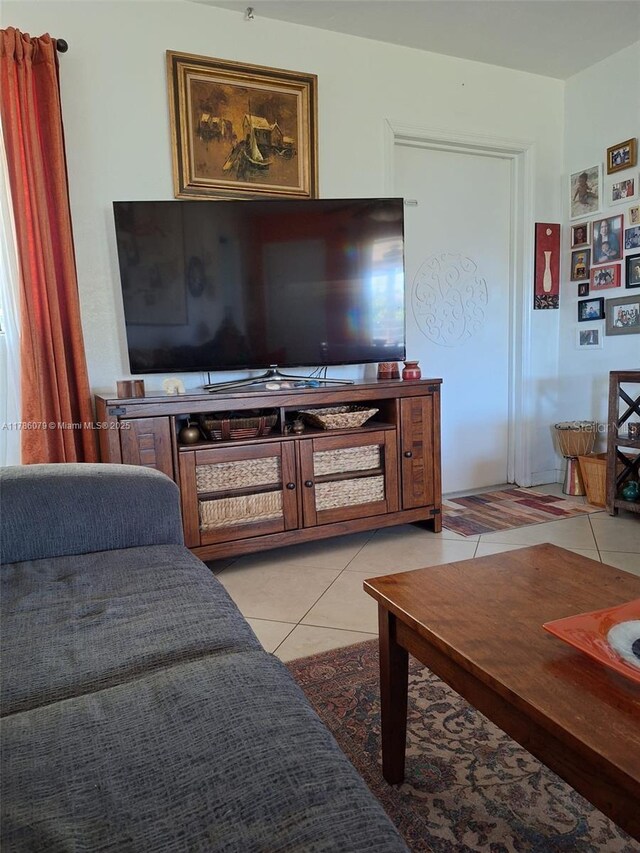 living room with light tile patterned floors