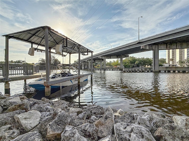 dock area featuring a water view