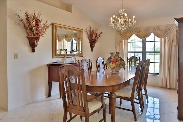dining area with an inviting chandelier, light tile patterned floors, baseboards, and a wealth of natural light
