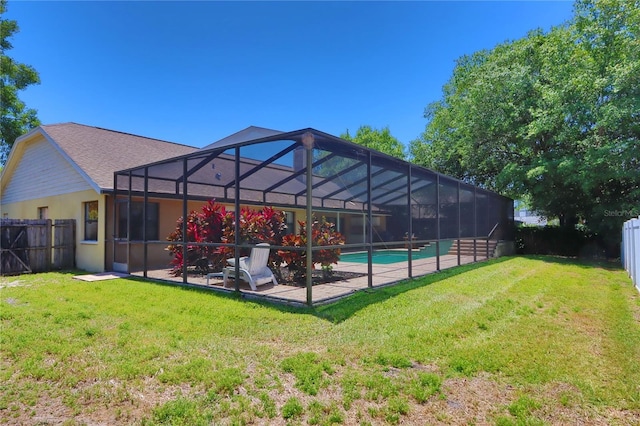 view of swimming pool with a fenced backyard, a fenced in pool, a patio, and a lawn