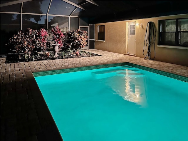 pool featuring a patio and a lanai