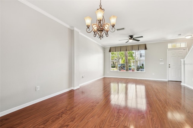 unfurnished living room featuring visible vents, ornamental molding, ceiling fan with notable chandelier, and wood finished floors