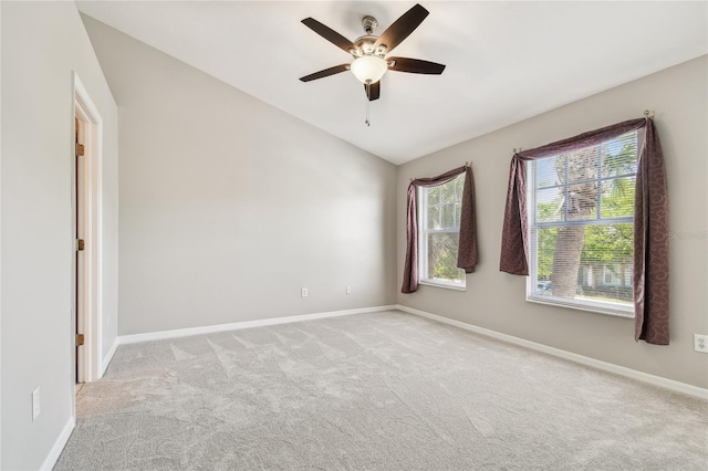 unfurnished room featuring baseboards, a ceiling fan, and carpet flooring