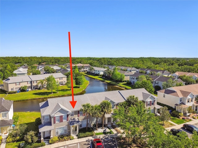 aerial view with a water view and a residential view