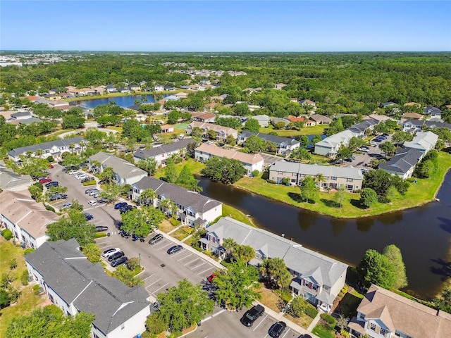 bird's eye view featuring a water view and a residential view