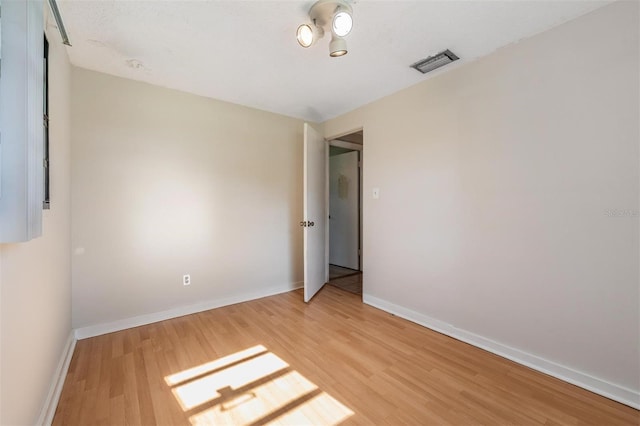 15808 Willowdale Rd, Tampa, FL 33625 - spare room with light wood-style floors and baseboards