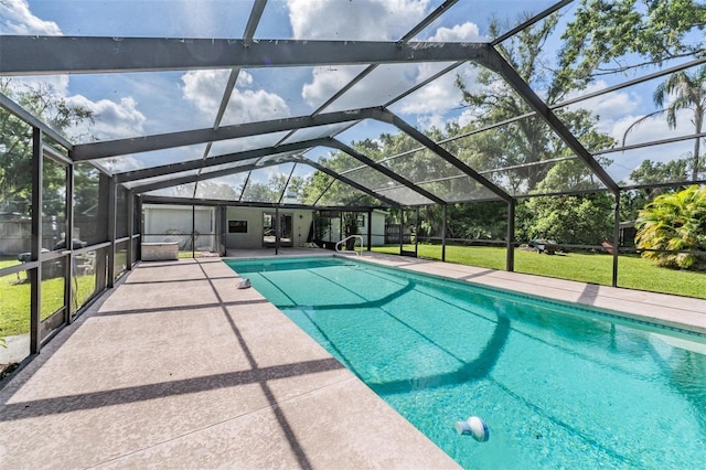 15808 Willowdale Rd, Tampa, FL 33625 - outdoor pool with a patio, glass enclosure, and a lawn