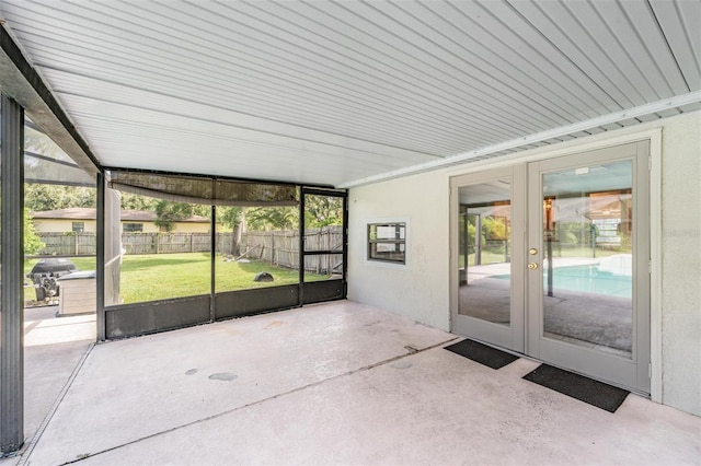 15808 Willowdale Rd, Tampa, FL 33625 - unfurnished sunroom featuring french doors and healthy amount of natural light