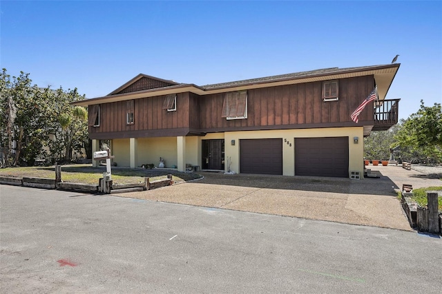 townhome / multi-family property with concrete driveway