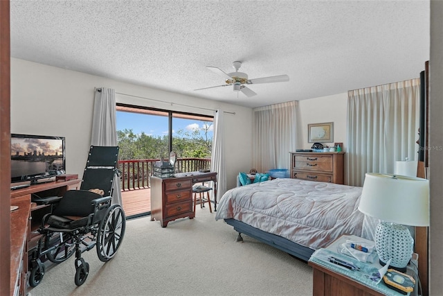 bedroom featuring access to outside, carpet, a ceiling fan, and a textured ceiling
