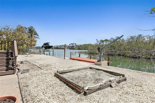 view of dock with a water view