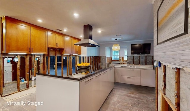 4511 Huntington St NE, Saint Petersburg, FL 33703 - kitchen featuring island range hood, recessed lighting, dark countertops, ornamental molding, and pendant lighting