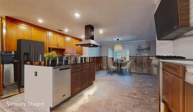 4511 Huntington St NE, Saint Petersburg, FL 33703 - kitchen featuring island range hood, appliances with stainless steel finishes, extractor fan, dark countertops, and brown cabinetry