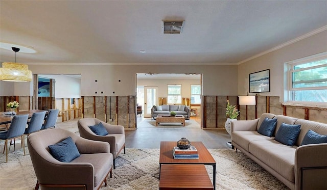 4511 Huntington St NE, Saint Petersburg, FL 33703 - living area featuring ornamental molding and wood finished floors
