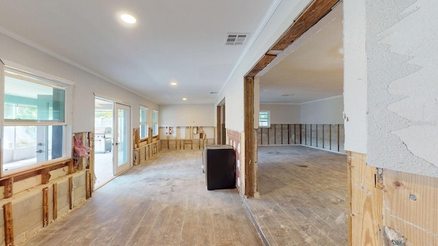 4511 Huntington St NE, Saint Petersburg, FL 33703 - spare room with ornamental molding and light wood-type flooring
