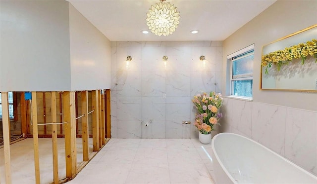 4511 Huntington St NE, Saint Petersburg, FL 33703 - bathroom with a soaking tub, tile walls, recessed lighting, and a shower