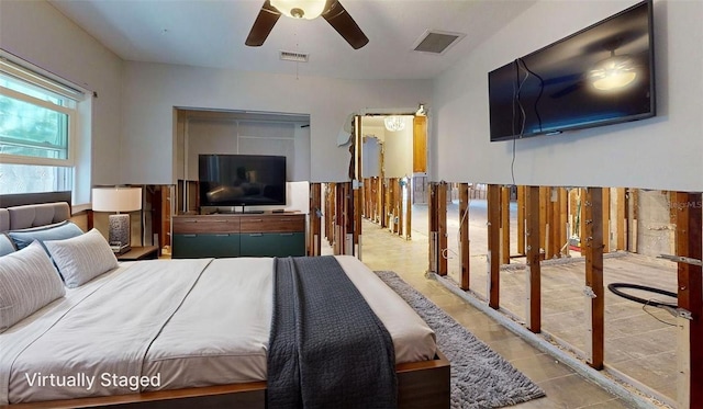 4511 Huntington St NE, Saint Petersburg, FL 33703 - tiled bedroom with ceiling fan