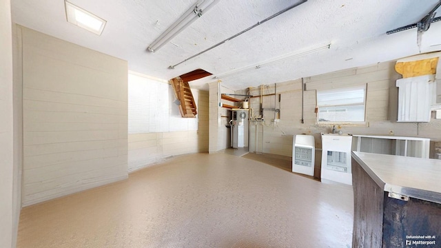 4511 Huntington St NE, Saint Petersburg, FL 33703 - garage featuring concrete block wall