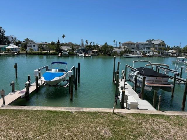 12478 Capri Cir N Unit 2, Treasure Island, FL 33706 - dock area with a water view and boat lift