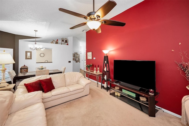 living room with carpet flooring, a textured ceiling, vaulted ceiling, and ceiling fan with notable chandelier