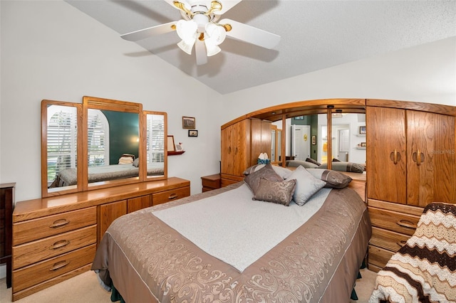 bedroom featuring arched walkways, ceiling fan, lofted ceiling, and light carpet
