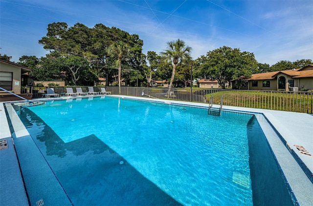 community pool with fence