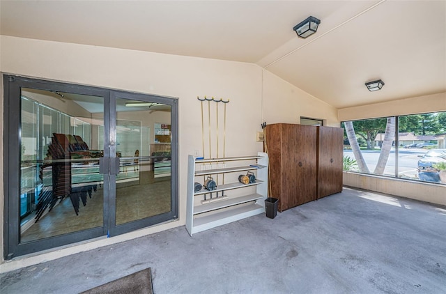 sunroom / solarium featuring french doors