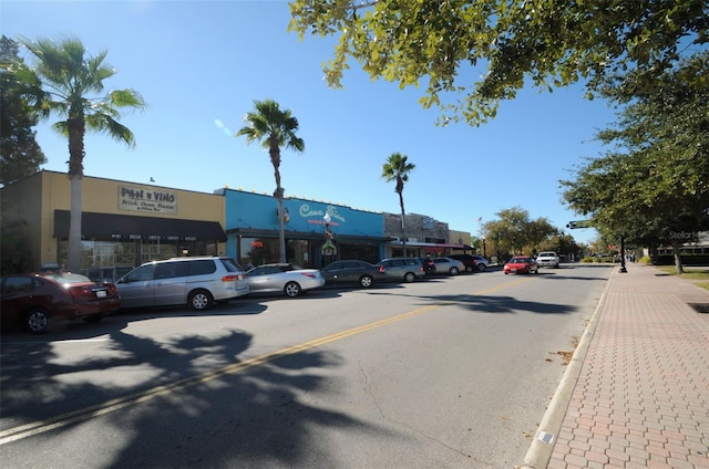 view of street featuring curbs