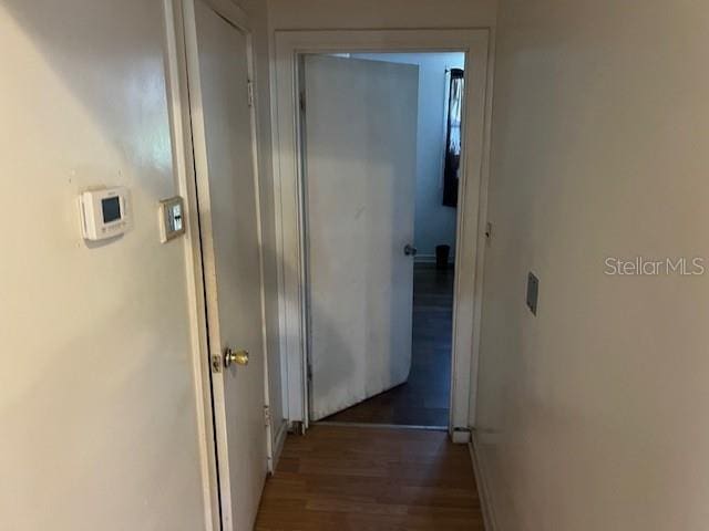 hallway featuring wood finished floors