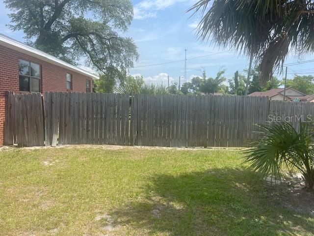view of yard featuring fence