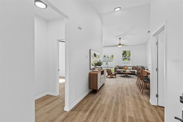 7603 Rhode Island Dr, Tampa, FL 33619 - hall featuring baseboards and light wood-type flooring