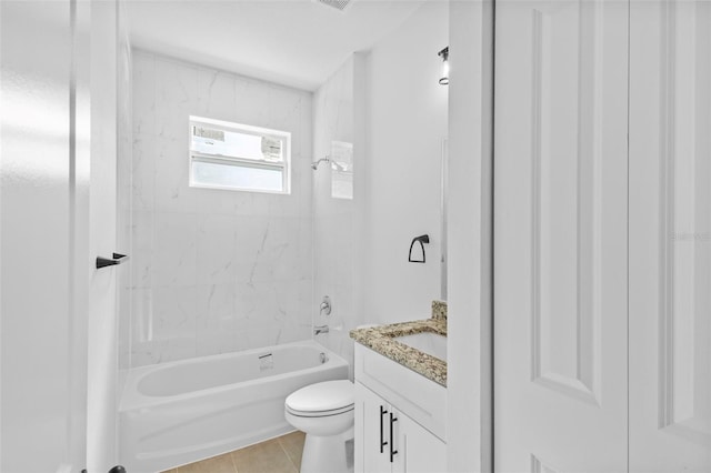 7603 Rhode Island Dr, Tampa, FL 33619 - bathroom with shower / bathing tub combination, toilet, vanity, and tile patterned floors