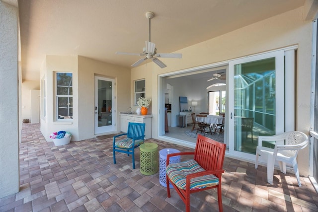 4815 Queen Palm Ter NE, Saint Petersburg, FL 33703 - view of patio / terrace with ceiling fan and a sink