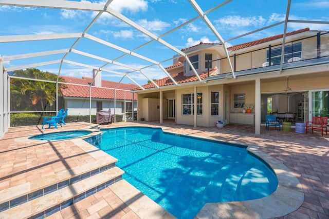 4815 Queen Palm Ter NE, Saint Petersburg, FL 33703 - view of swimming pool with a patio, a pool with connected hot tub, and glass enclosure